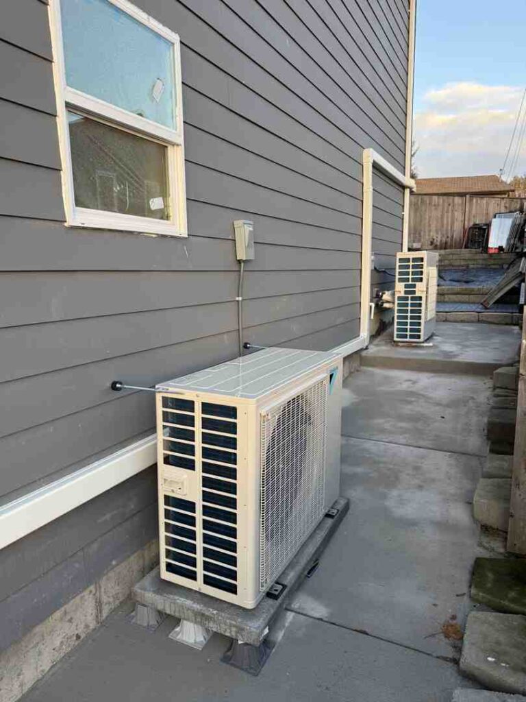 ductless mini split outdoor unit on classic craftsman older home